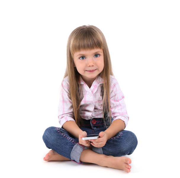 Beautiful little girl with mobile phone - Фото, зображення