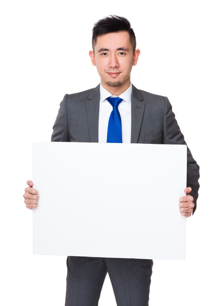 Молодий азіатський бізнесмен у діловому костюмі
 - Фото, зображення