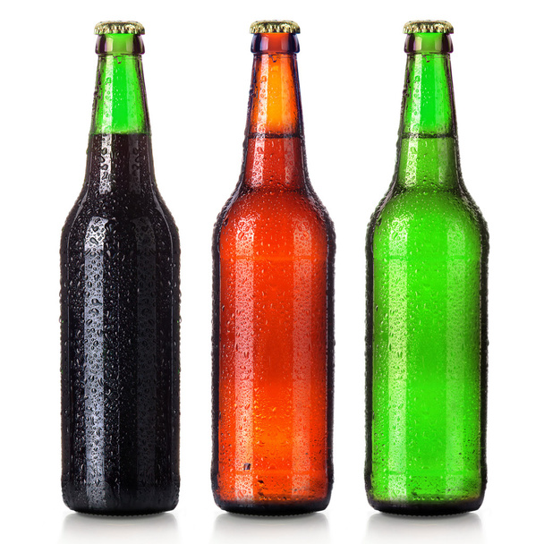Set of beers bottles with frosty drops isolated - Foto, Imagem
