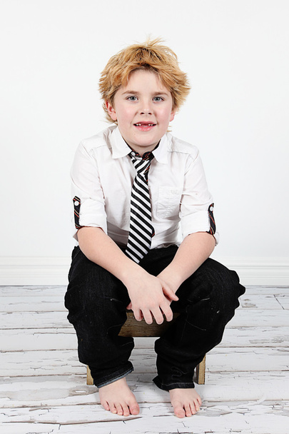 Cute little boy posing for camera on white background - Zdjęcie, obraz