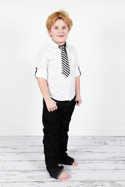 Cute little boy posing for camera on white background - Fotografie, Obrázek