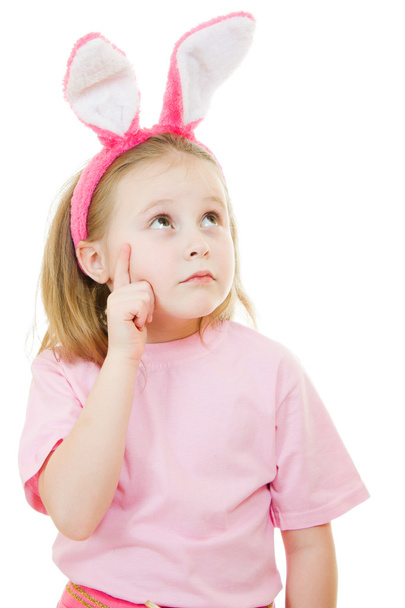 The little girl with pink ears bunny on white background. - Zdjęcie, obraz