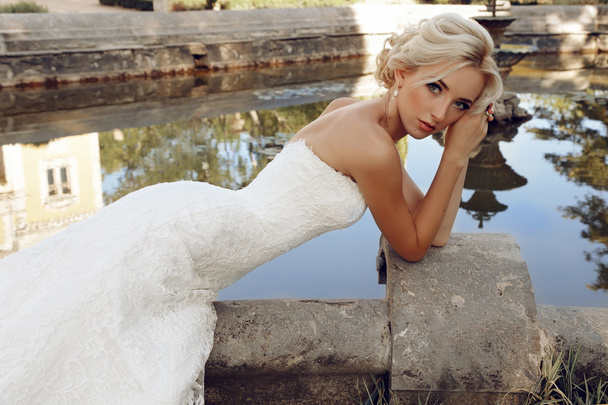 gorgeous bride with blond hair - Фото, зображення