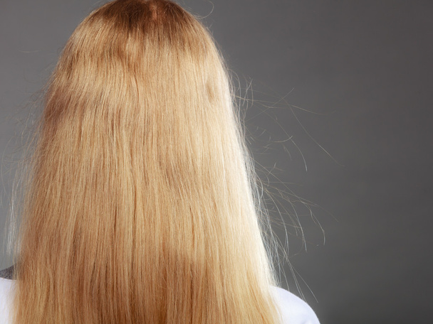Closeup of woman with static blonde hair. - Fotó, kép