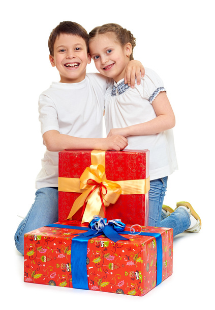 boy and girl with red gift box and golden bow - holiday object concept isolated - Фото, зображення
