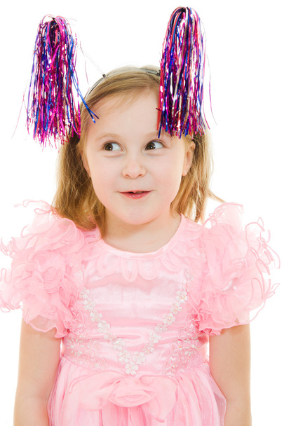 Funny girl in a pink dress with antennae on their heads on a white backgrou - Foto, immagini