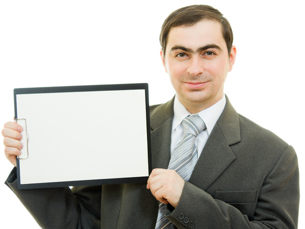 A businessman with a white blank sheet of paper on a white background. - Photo, image