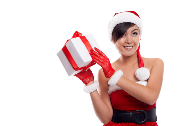 Santa hat Christmas woman holding christmas gifts smiling - Zdjęcie, obraz