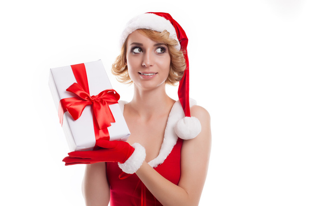 Beautiful sexy girl holds Santa Claus gift  on a white backgroun - Foto, imagen