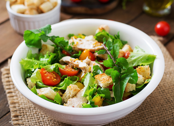 Salad with chicken, mozzarella and  tomatoes - Фото, изображение