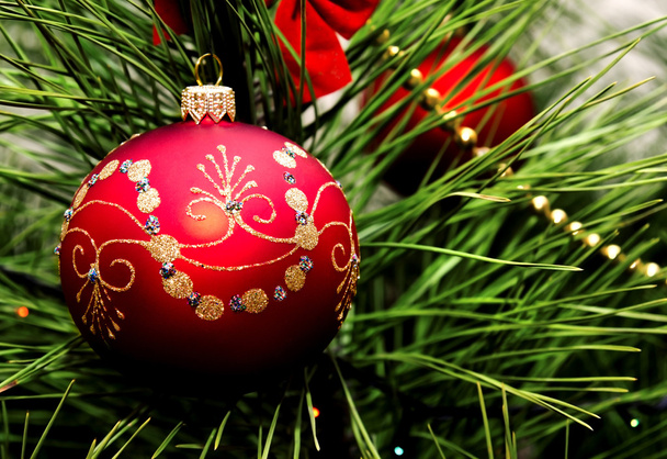 Christmas ball hanging on fir tree - Foto, afbeelding