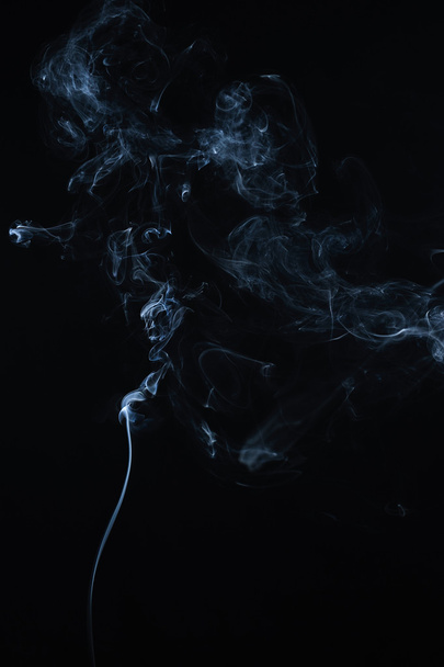 Abstract smoke moves on a black background. - Photo, Image