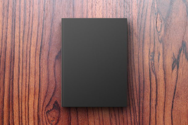Black diary on a wooden table - Foto, afbeelding