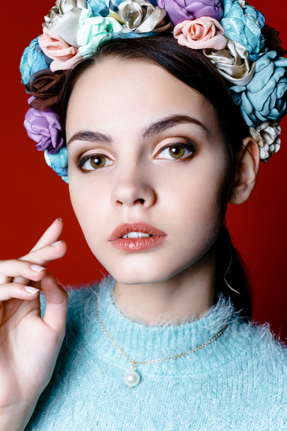 Model with a wreath of flowers - Photo, Image
