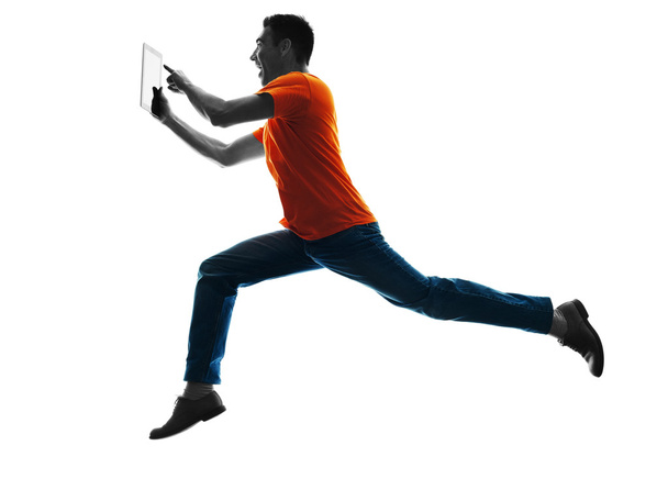 man running Digital Tablets silhouette isolated - Photo, Image