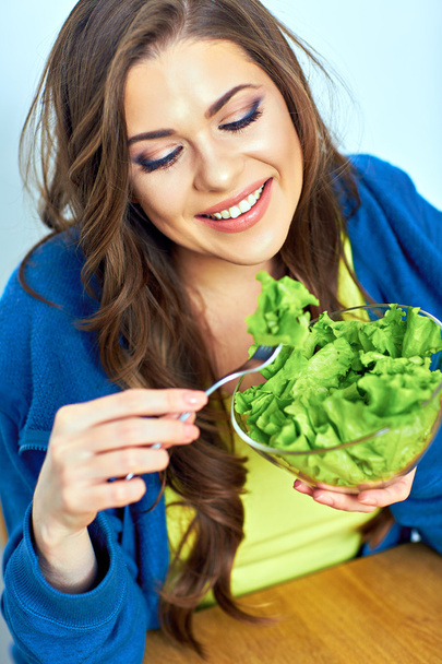 Woman eating salad - Fotó, kép