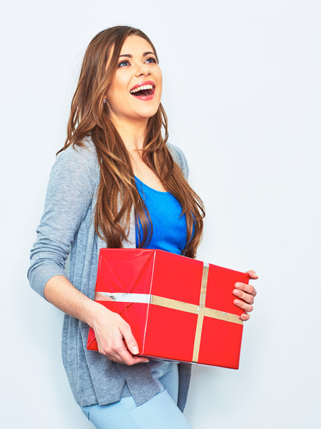 Woman holds big gift box - 写真・画像