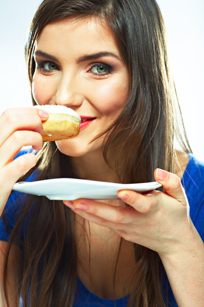 Woman eating donut - Foto, imagen