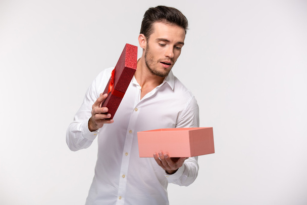 Businessman opening gift box - Φωτογραφία, εικόνα