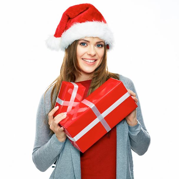 Санта дівчинка тримає червоний подарункові коробки - Фото, зображення