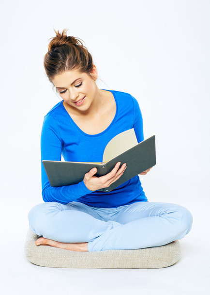 student sitting with open book - Foto, immagini