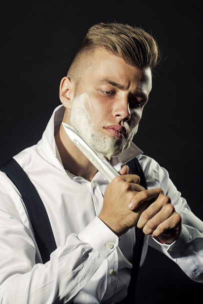 Young shaving boy - Foto, imagen