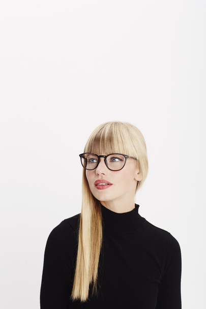 Glamorous woman wearing spectacles - 写真・画像