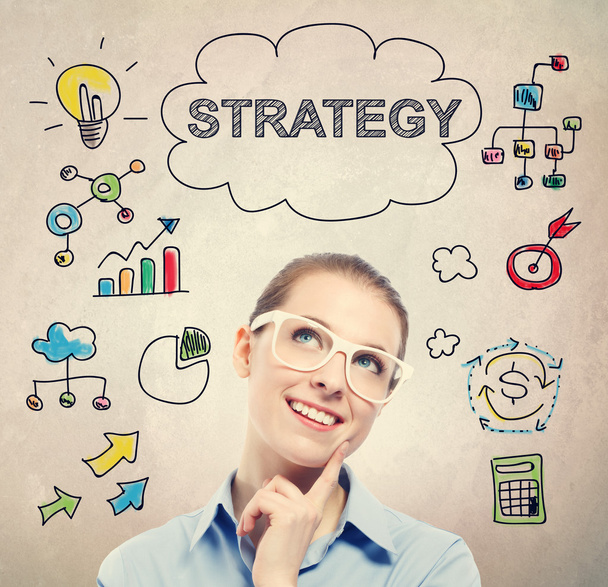 Strategy concept with young business woman - Photo, Image