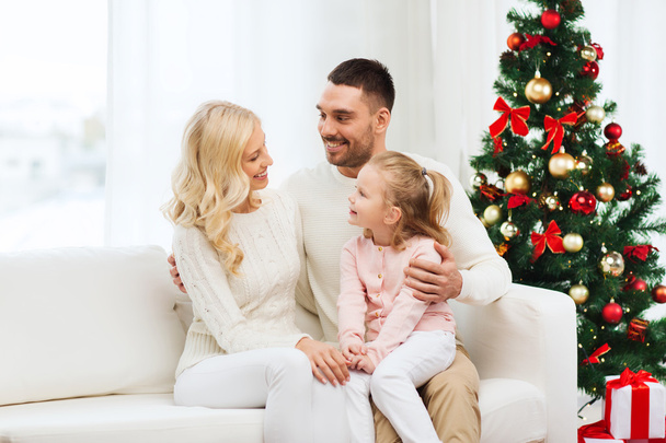 happy family at home with christmas tree - Zdjęcie, obraz