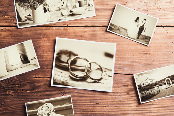 Wedding photos on a table - Фото, зображення