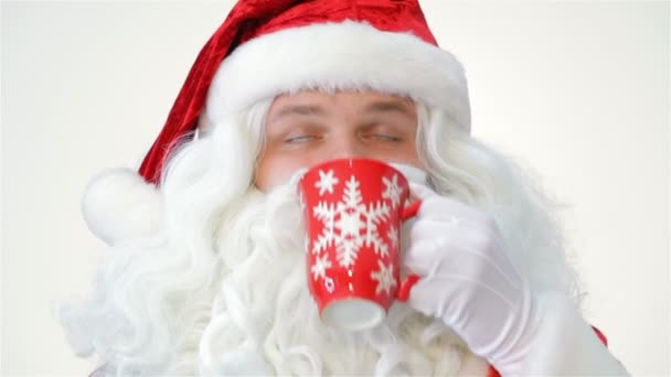 Santa drinks from a red cup - Footage, Video