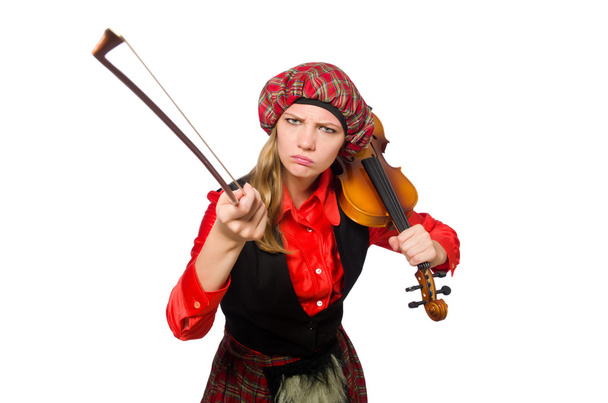 Vicces nő skót ruhában hegedűvel - Fotó, kép