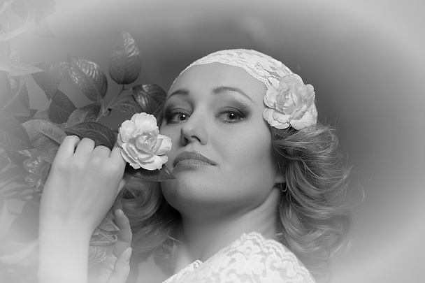 Retro portrait of Pretty woman with roses - Photo, Image