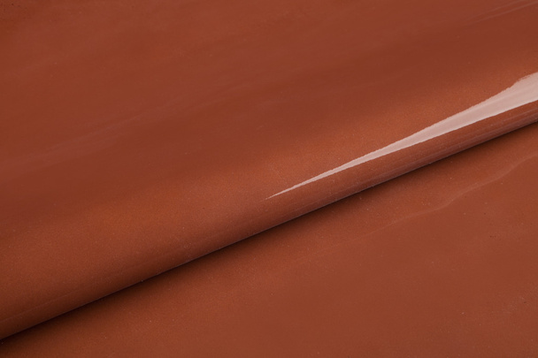 Textura de superficie brillante lisa marrón
 - Foto, imagen