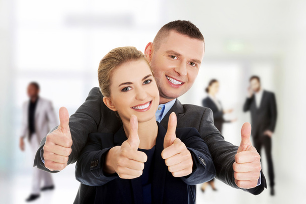 Business couple showing thumbs up - Fotoğraf, Görsel