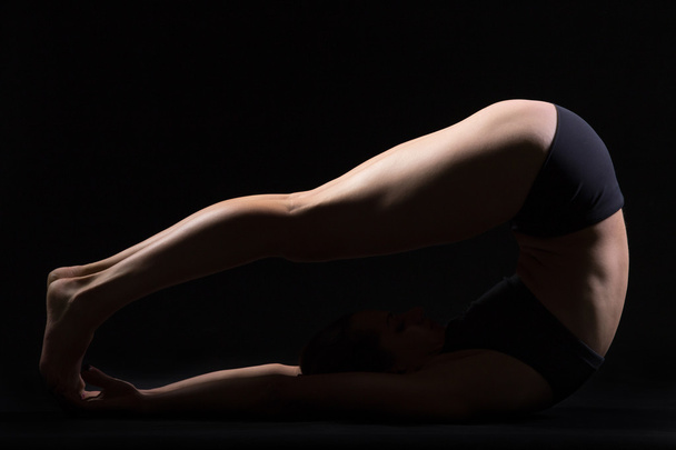 Yoga Plow Pose - Foto, afbeelding