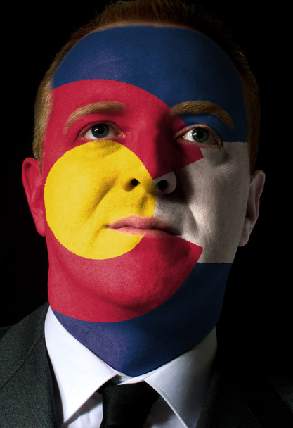 Estado de bandera de colorado pintado rostro de hombre de negocios o político
 - Foto, imagen