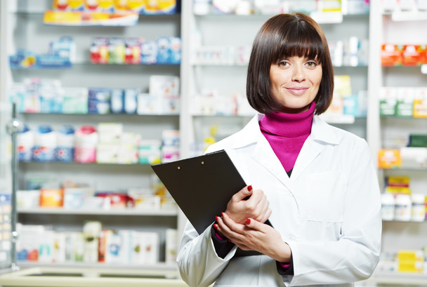 Pharmacy chemist woman in drugstore - Fotoğraf, Görsel