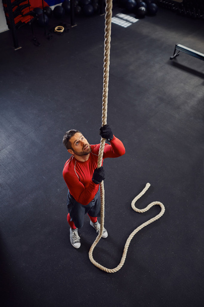 Athlete before rope climb exercise - Photo, image