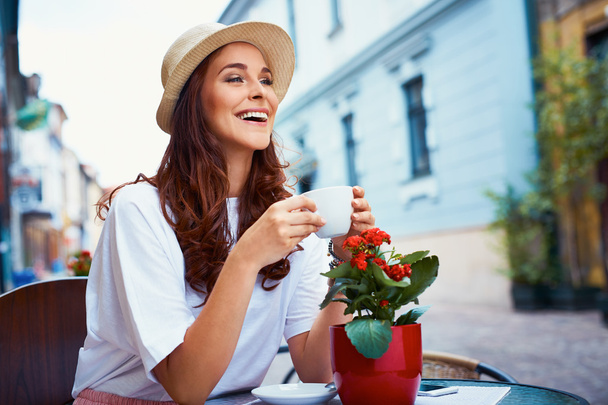 Attractive woman drinking coffee - Foto, Imagem