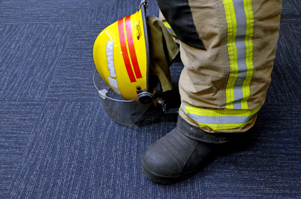 Firefighter uniform suite, helmet and boots - Zdjęcie, obraz
