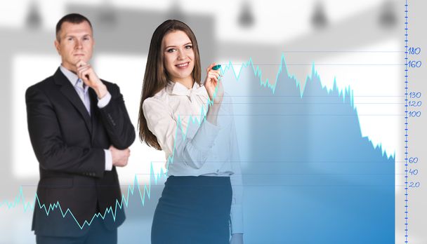 Businessman and woman near with big graph - Photo, Image