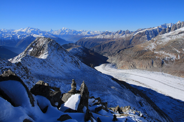 Aletsch Glacier and distant view of the Matterhorn, Weisshorn and other high mountains - Photo, Image