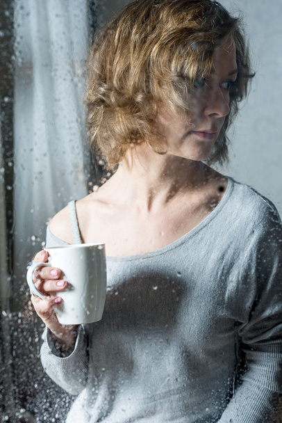 Portrait of Young woman with cup - Zdjęcie, obraz