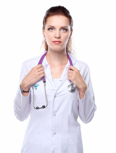 Portrait of young woman doctor with white coat standing - Foto, Bild