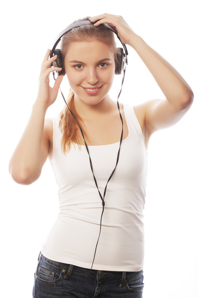 Woman with headphones listening music . Music teenager girl isol - Fotoğraf, Görsel