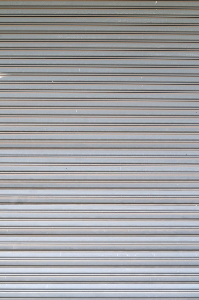 Візерунок сріблясто-сірого вгору двері
. - Фото, зображення