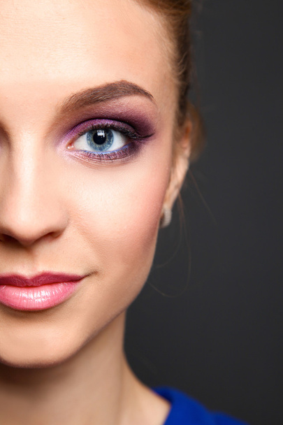 Studio shot of a beautiful young woman wearing professional makeup - Foto, Bild