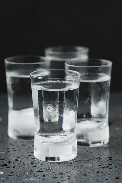 glasses of vodka on  table - Fotoğraf, Görsel