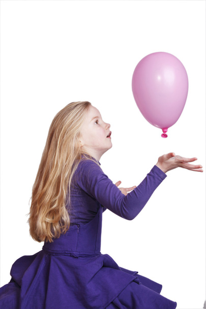 Nuori tyttö vaaleanpunainen ilmapallo
 - Valokuva, kuva